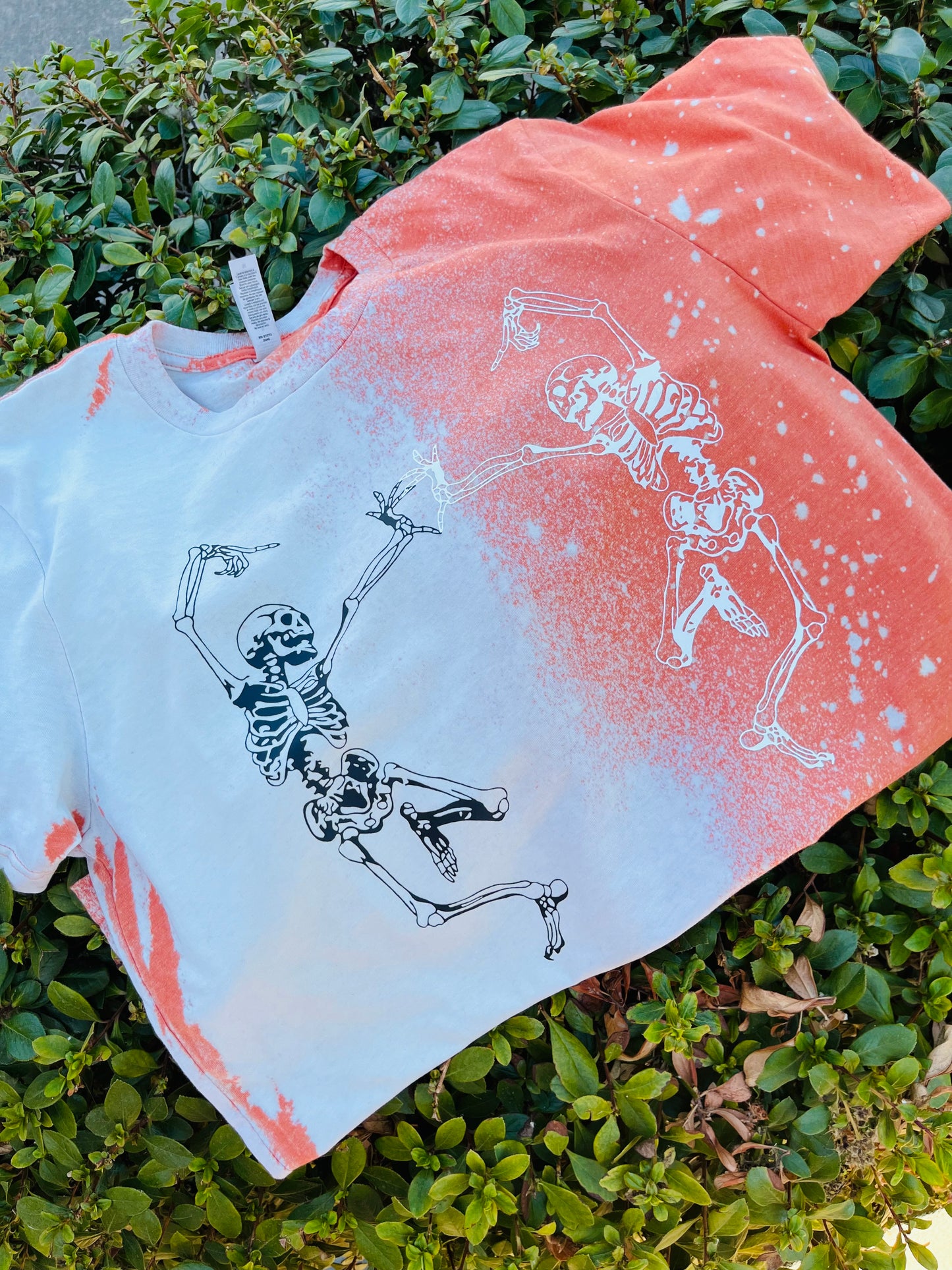 Orange dancing Skellie tees